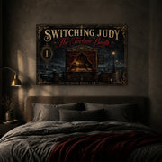 The Fortune Booth landscape canvas depicting a candlelit seaside fortune booth, shown in a moody bedroom above a bed.